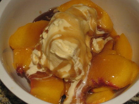 Sliced Peaches and Vanilla Ice Cream w/Warm Rum Sauce